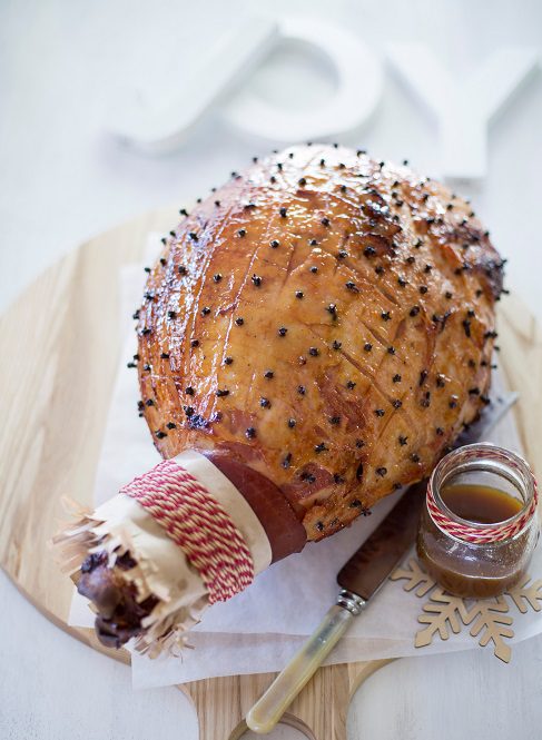Baked ham glazed with fresh apricots, brown sugar and orange