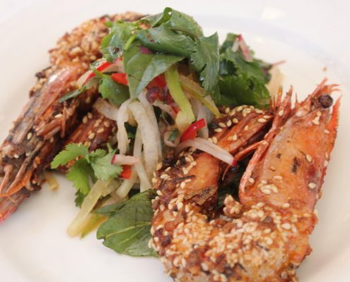 sesame prawn with asian vegetable and pear salad